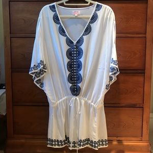 Cute beach dress or bathing suit cover up.